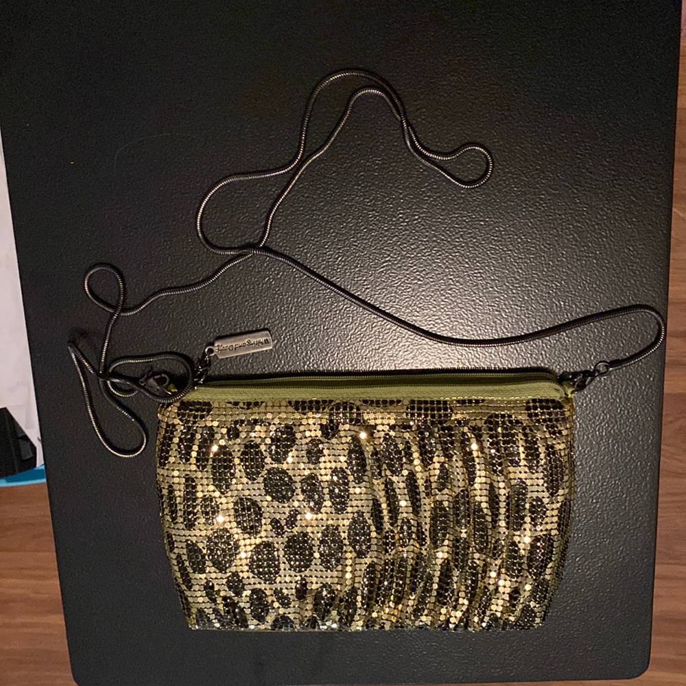 Beautiful bag sparkling green with black dots.